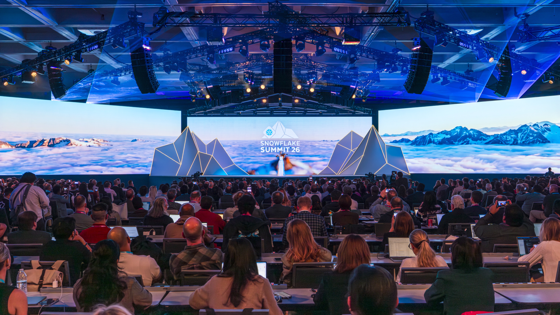 The Gaussian splat opener on the 143 ft LED wall at Snowflake Summit